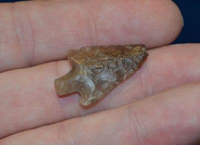 An excellent and superbly worked Late Neolithic / Early Bronze age flint barbed and tanged arrowhead from Suffolk. SOLD