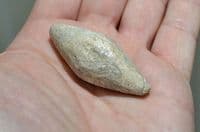 An excellent and unusually large Roman Military lead ovoid sling shot, European. SOLD