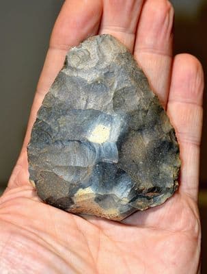 An excellent and well worked Paleolithic Mousterian (Neanderthal) flint hand axe, France, SOLD