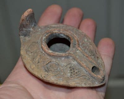 An excellent early Byzantine Terracotta oil lamp featuring Grape vine decoration (N26) SOLD