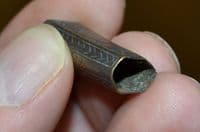 An excellent Medieval bronze dagger Chape featuring engraved figures, River Thames, London. SOLD