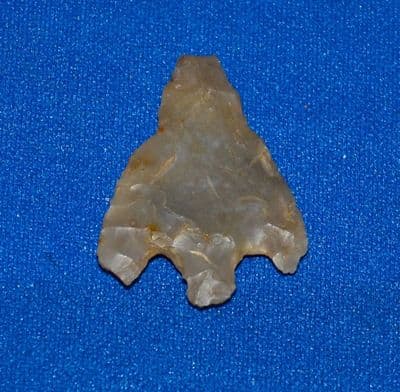 An excellent Neolithic flint Barbed and Tanged arrowhead from Sussex. SOLD