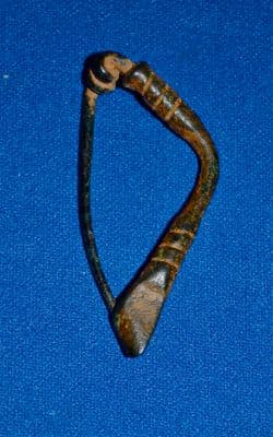 An excellent quality and complete Ancient Persian bronze "Arm & Hand" fibula brooch. SOLD