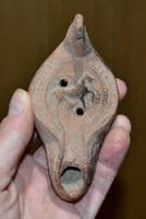 An excellent Roman terracotta oil lamp featuring Horse & Rider design, Palestine. SOLD