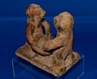 An extremely rare Pre-classic period Mayan pottery figurative oil lamp. SOLD
