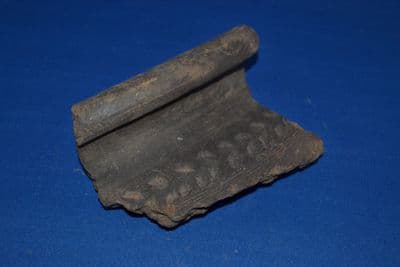 An impressive decorated rim section from a large Late Iron Age storage jar, found Brantham, Suffolk. SOLD