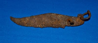 An impressive Viking period iron knife with gently curved blade and original suspension loop. SOLD