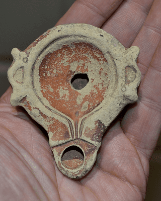 An unusual and elaborate Roman terracotta oil lamp, Tunisia, N.Africa. SOLD