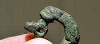 An unusual and sizable Anglo Saxon bronze buckle featuring the heads of two beasts, Yorkshire. SOLD