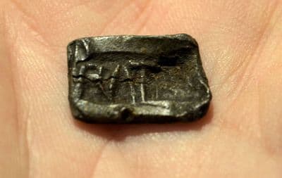 An unusual small Roman lead rectangular token or seal with 