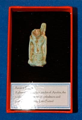 The upper half of a large Ancient Egyptian amulet of Anubis, God of the Underworld. SOLD