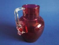 Antique Victorian Cranberry Glass Jug with Decorative Handle c1880