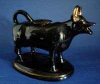 Excellent Victorian Jackfield Pottery Black and Gilt Cow Creamer with Lid c1875