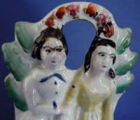 Miniature Staffordshire Pottery Arbor of a Seated Scottish Couple c1860
