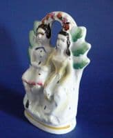 Miniature Staffordshire Pottery Arbor of a Seated Scottish Couple c1860