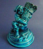 Royal Worcester Turquoise Majolica 'Boy with Firewood' Spill Holder after Hadley c1880