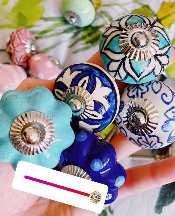 A close-up of a variety of colour door knobs from Knobbles and Bobbles