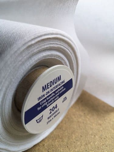 204w Standard finish, medium weight iron on interfacing, White