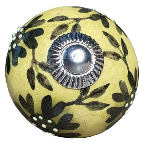 Brown knob with black flowers