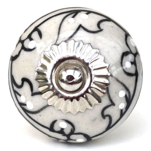 Cream with black pattern and white embossing