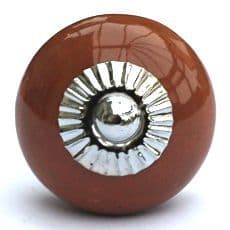 Darker brown round knob