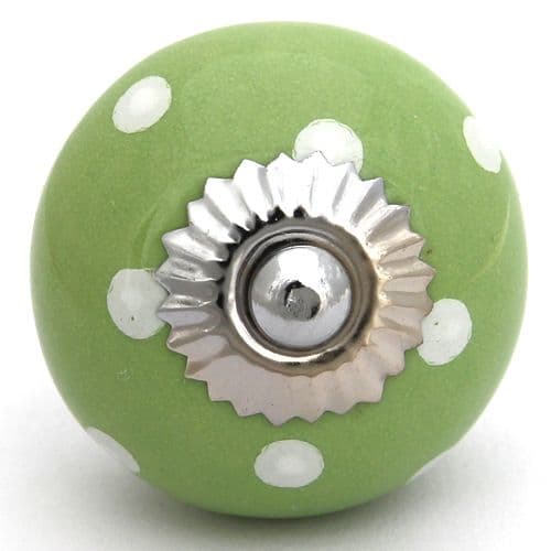 Green knob with white spots