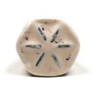 Hexagonal distressed knob in cream