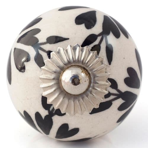 Off white knob with black flowers