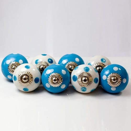 Set of eight spotty blue knobs