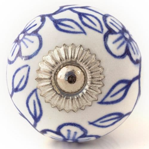 White knob with blue flowers