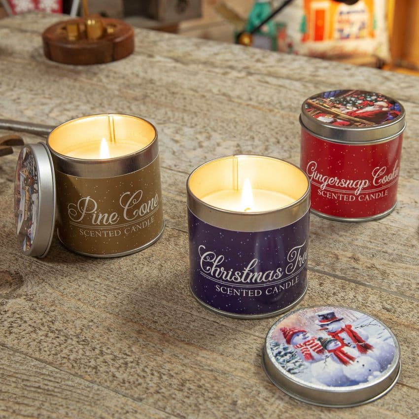 Christmas Scented Tin Candles Gifts With traditional Christmas Illustrations. Stocking filler, table gift and secret santa ideas.