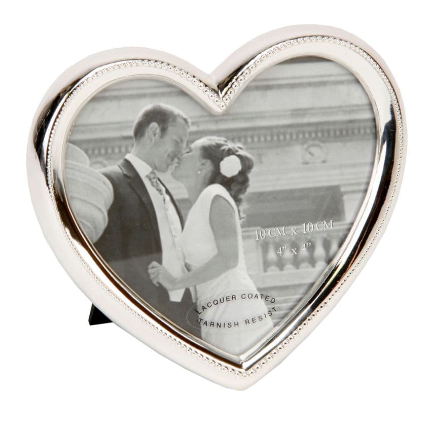 Simple minimalist and Elegant Heart Shape Silver Photo Frame. A beautiful gift idea for wedding and anniversary presents. High quality tarnish resistant silver plated frame with delicate beading design.