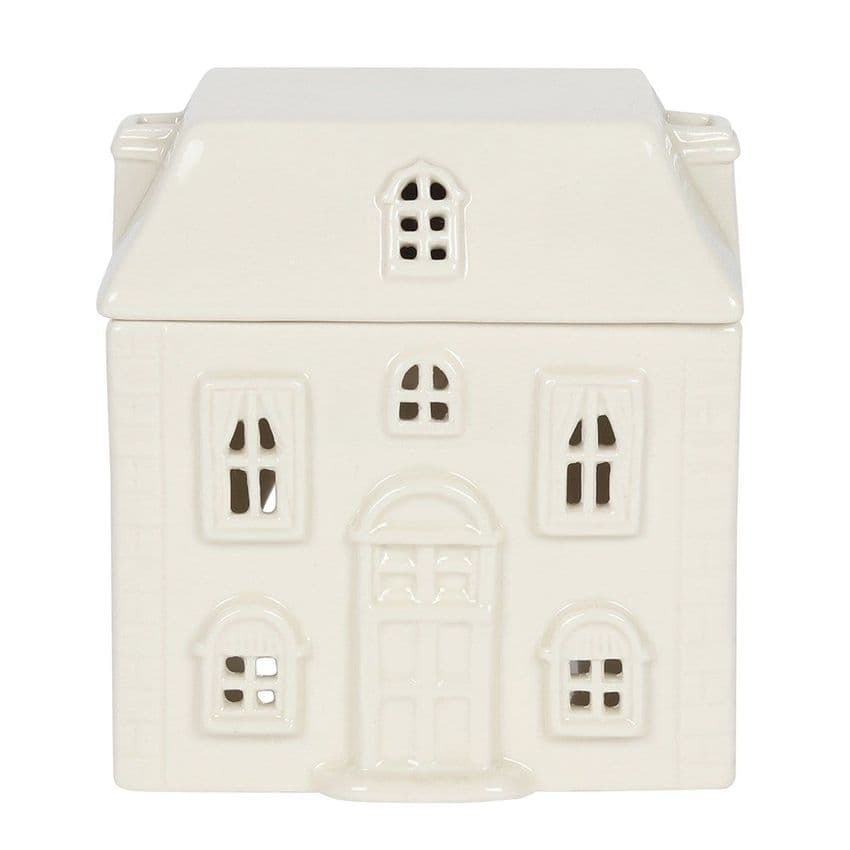 White Ceramic House Oil and Melt Burner. Use this unusual burner with wax melts or fragranced oil.