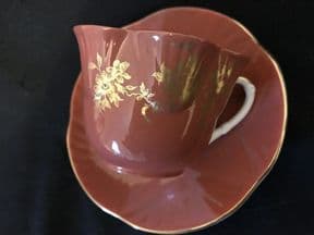 Crown Staffordshire burnt orange cup & saucer