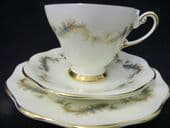 E Brain china Blue & gilt feathers tea trio