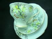 Paragon winter berries on blue tea trio