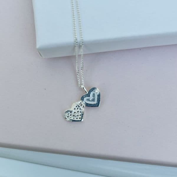 Delicate silver locket & cross