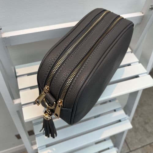 Faux leather two compartment tassel bag with strap