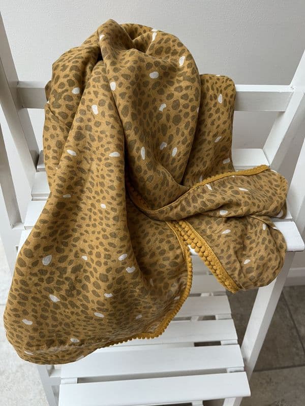 SALE: Mustard animal print scarf with pom pom trim