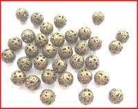 33 Hollow spacer beads. 6mm. In 5 colours.