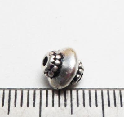 Abacus beads x 25. Tibetan style silver x 25. 7mm.