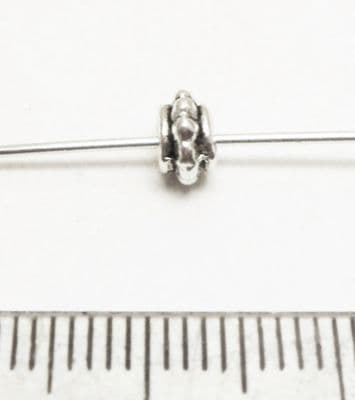 Bobble spacers x 16. Tibetan style silver. 6mm x 4mm