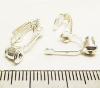 Clip on converter earrings x 4. Silver plated.