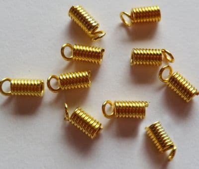 Coil Crimps Gold Plated x 10. approx 8mm x 3.5mm. For 2mm thong.