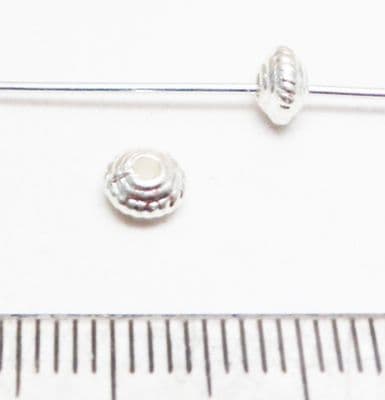 Disc spacer bead x 30.  Bright Silver. 5mm.