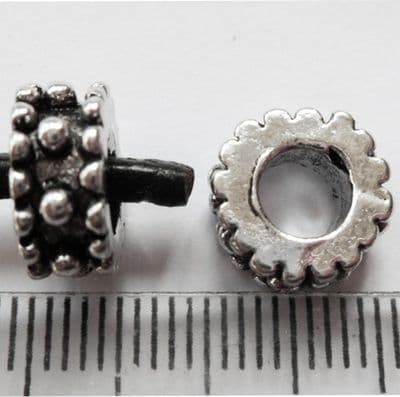 Dotted Tibetan Silver bead with large 4.7mm hole. 11mm x 4.5mm