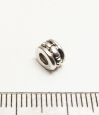 Dotted tube spacer bead. 4.5mm. x 40.