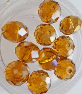 Faceted beads 8mm x 6mm. Gold x 10