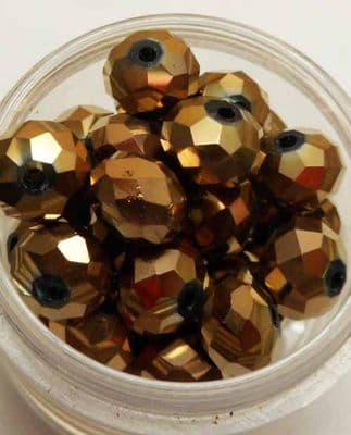Faceted Glass beads 8mm x 6mm. Bronze x 10