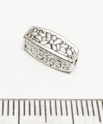 Floral pillar spacer beads x7. 12mm x 5mm. Silver